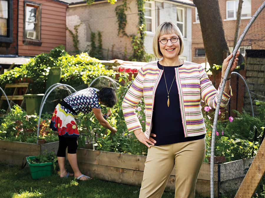 Lori Stahlbrand in a community garden on Huron Street.